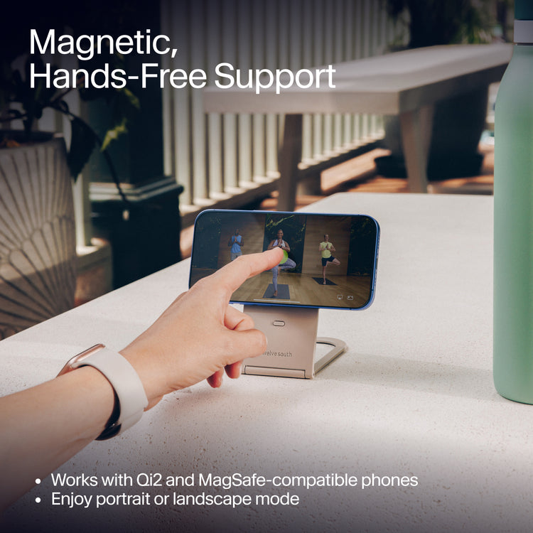 finger pointing at phone on magsafe charger