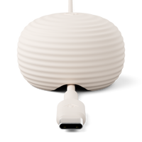 White weighted anchor with a USB-C connector on a white background