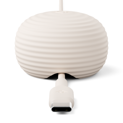 White weighted anchor with a USB-C connector on a white background