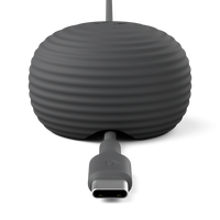 Gray cylindrical device with a USB-C connector on a white background