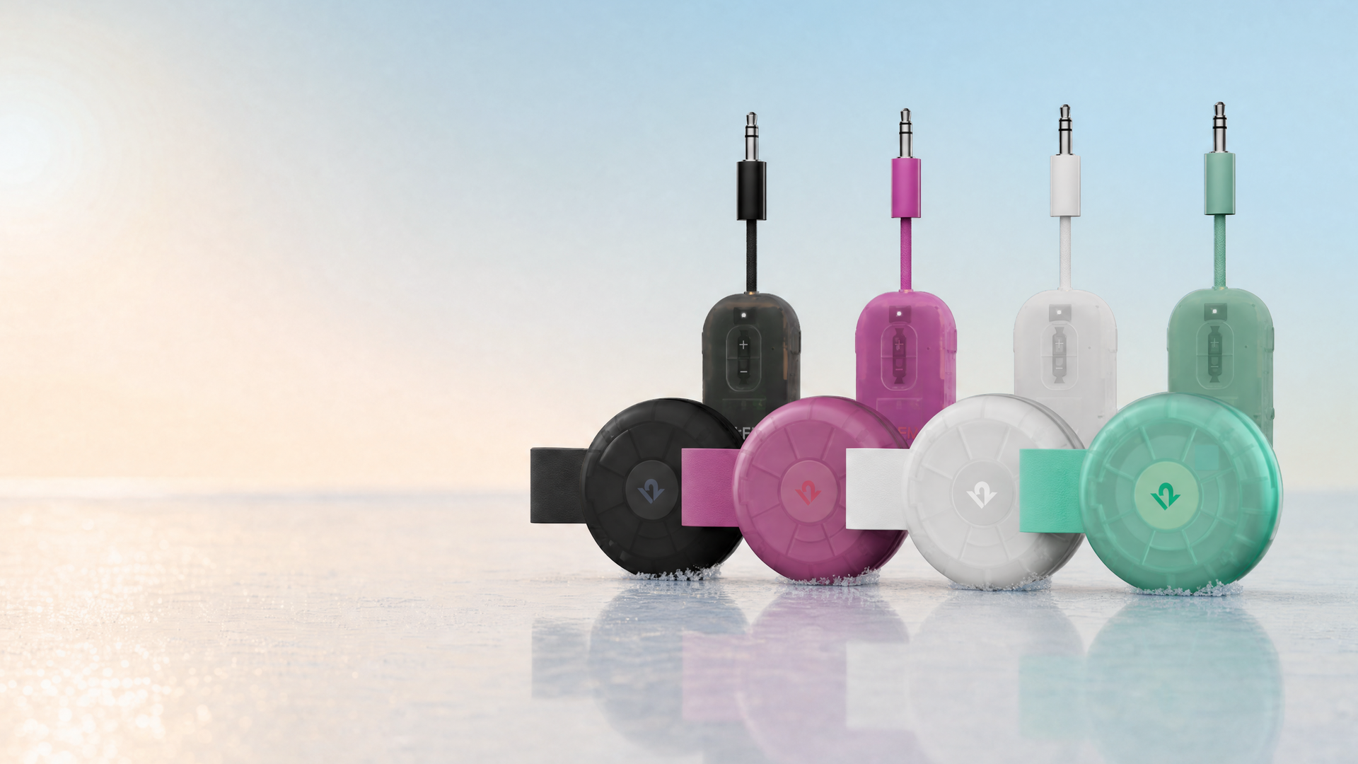 Set of colorful audio adapters on a reflective surface with a gradient background