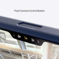 Close-up of a fluid camera control button on a device with a blurred indoor background.